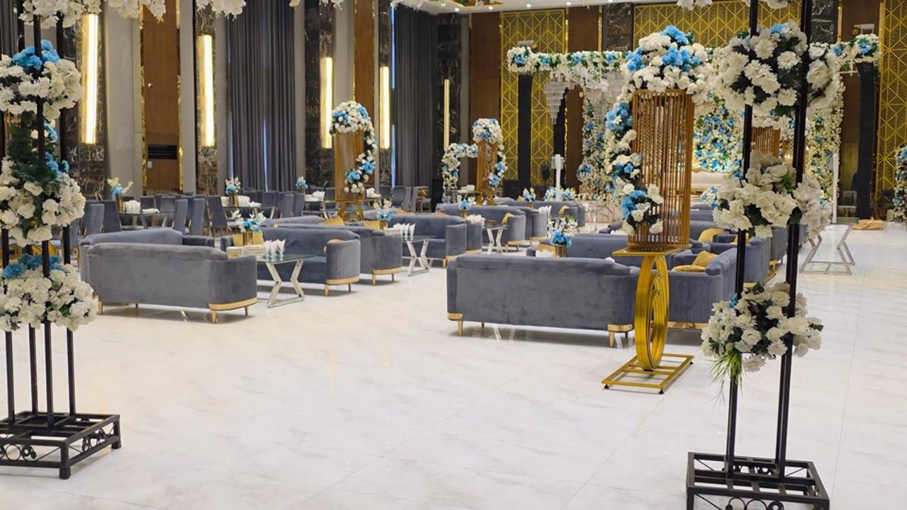 Floral aisle and lounge seating at Empire